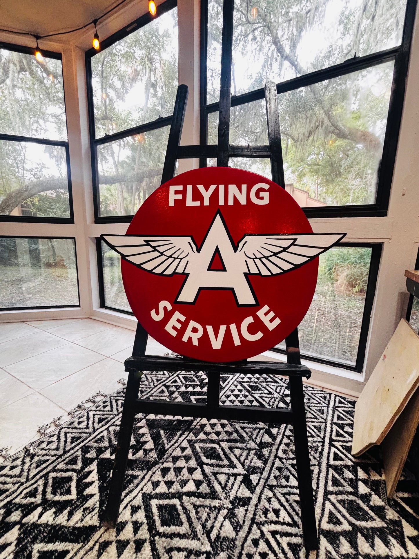 “FLYING A SERVICE” Sign